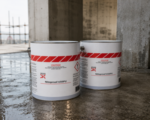 Fosroc Nitoproof 650 PU waterproof coating cans on construction site

