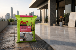 Roff T02 NSA non-skid adhesive holding stone tiles on a vertical surface