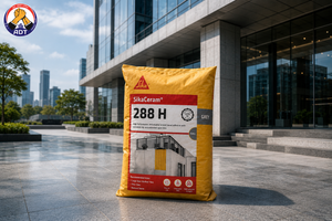 Sikaceram-288 H combed onto a facade for natural stone tiles